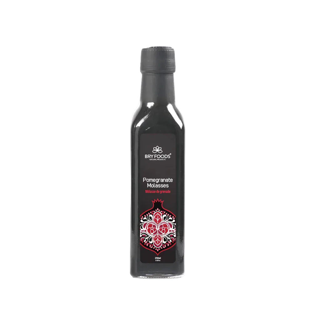 Bottle of Bry Foods Pomegranate Molasses on a white background
